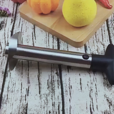 Dispozitiv pentru decojit/feliat ananas